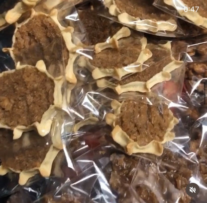 Authentic Jamaican gizzada pastry filled with sweet spiced coconut, freshly baked and packaged for sale. 
Conyers GA and Atlanta