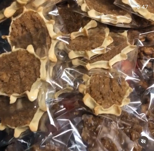 Authentic Jamaican gizzada pastry filled with sweet spiced coconut, freshly baked and packaged for sale. 
Conyers GA and Atlanta