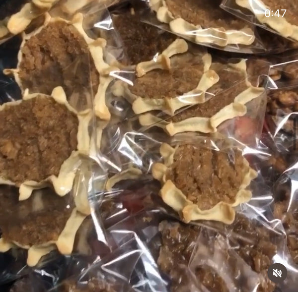 Authentic Jamaican gizzada pastry filled with sweet spiced coconut, freshly baked and packaged for sale. 
Conyers GA and Atlanta