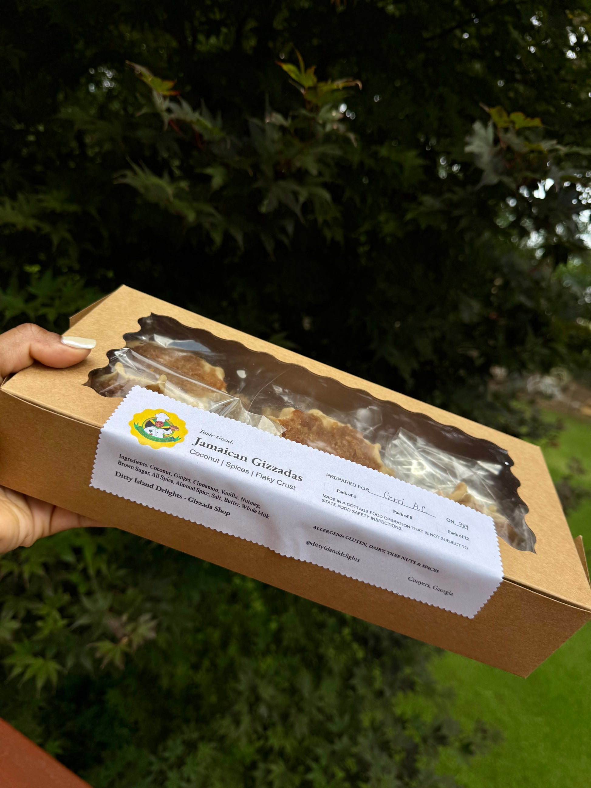 Authentic Jamaican gizzada pastry filled with sweet spiced coconut, freshly baked and packaged for sale. Conyers & Atlanta GA.
